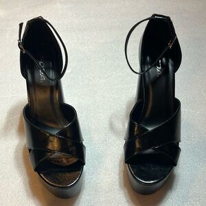 Platform strappy heels with ankle strap.